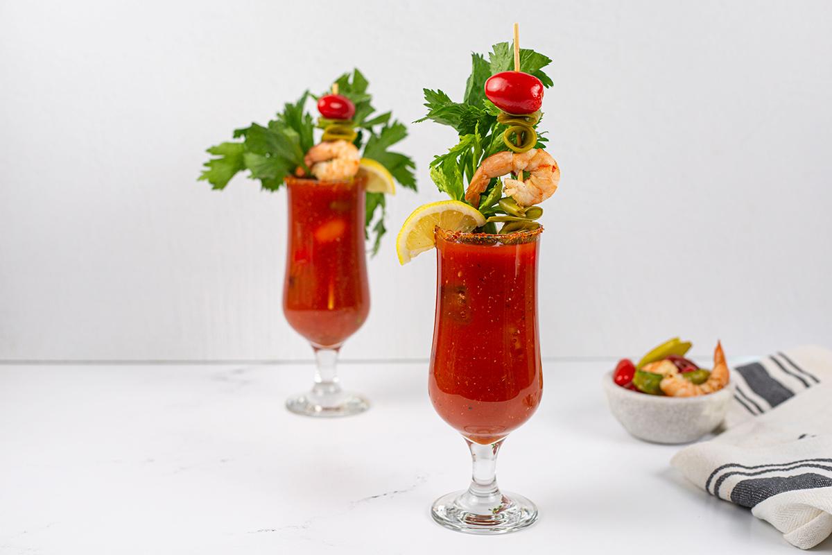 Marukan Spicy Bloody Mary with Pickled Shrimp, Cherry Tomatoes and Peas